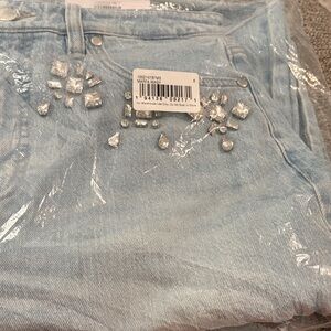 On 34th Marta wash barrel-light Blue with  stones on both front sides Jeans